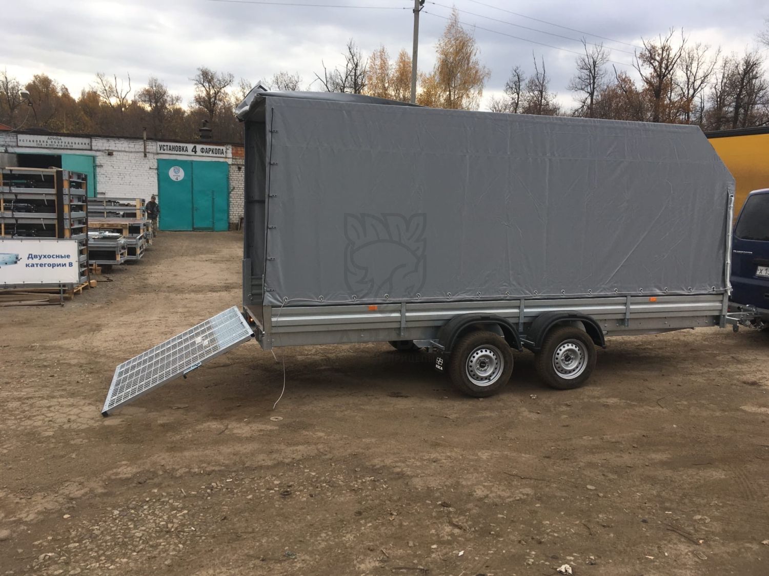 Прицеп МЗСА 817735.012 с трапом МЗСА