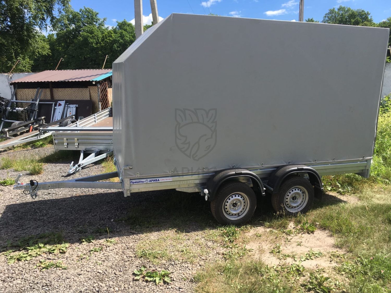 Двухосный прицеп МЗСА 817732.012 с заводским трапом и ЕВРО тентом