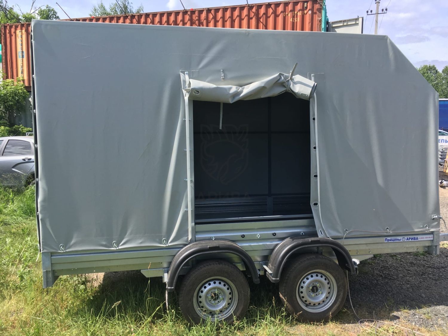 Двухосный прицеп МЗСА 817732.012 с заводским трапом и ЕВРО тентом