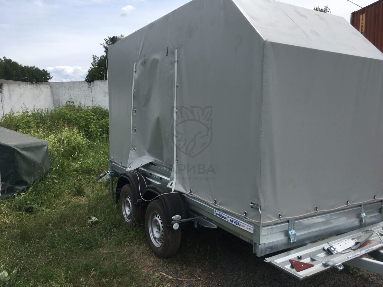 Двухосный прицеп МЗСА 817732.012 с заводским трапом и ЕВРО тентом
