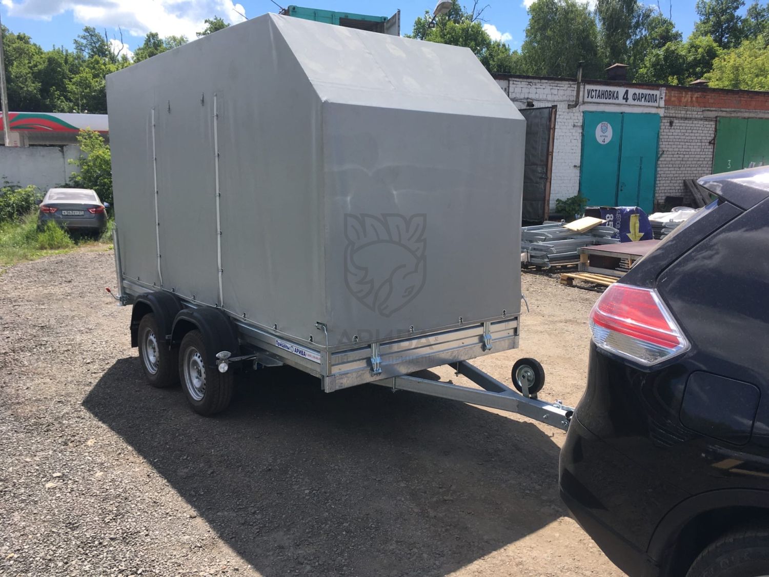 Двухосный прицеп МЗСА 817732.012 с заводским трапом и ЕВРО тентом