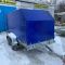 Прицеп двухосный для перевозки техники с трапом и синим ЕВРО тентом 
