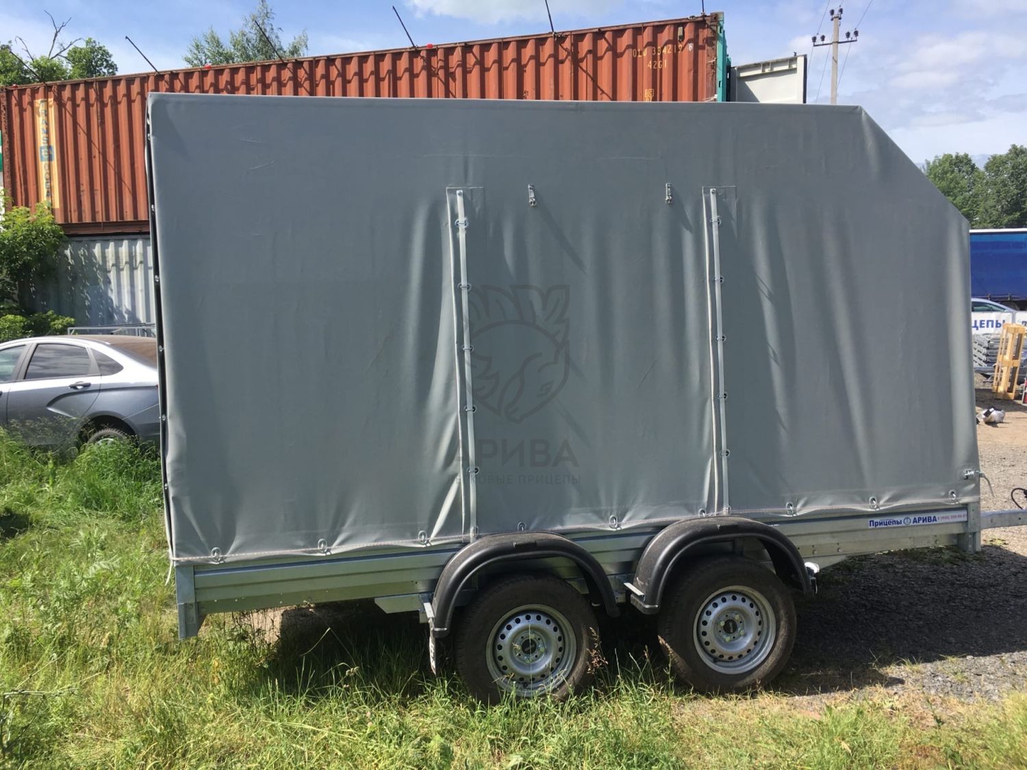 Двухосный прицеп МЗСА 817732.012 с заводским трапом и ЕВРО тентом