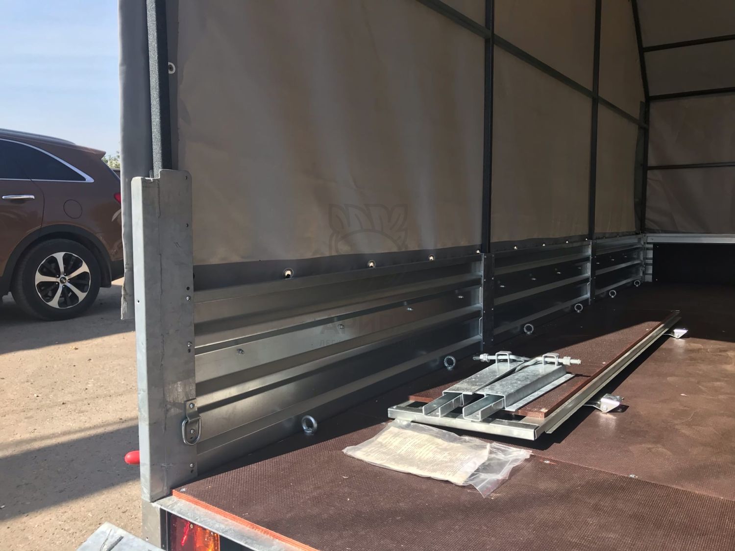 Прицеп МЗСА 817732.012 с трапом МЗСА