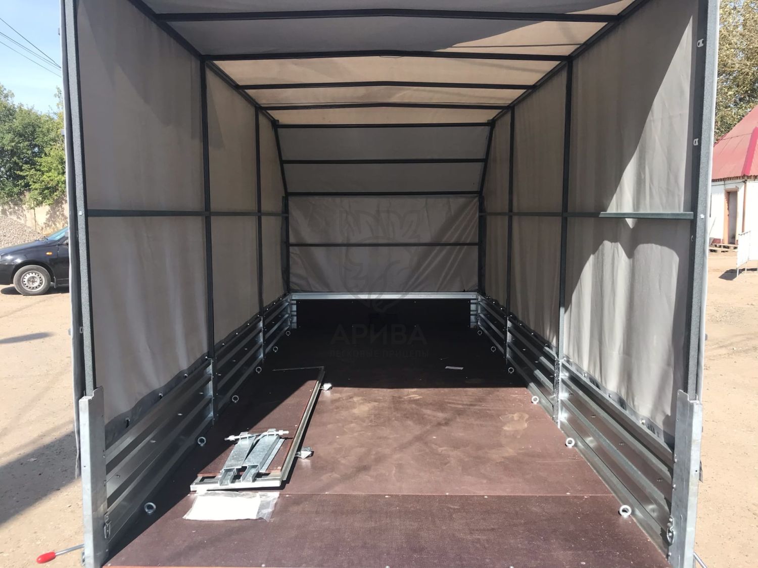 Прицеп МЗСА 817732.012 с трапом МЗСА