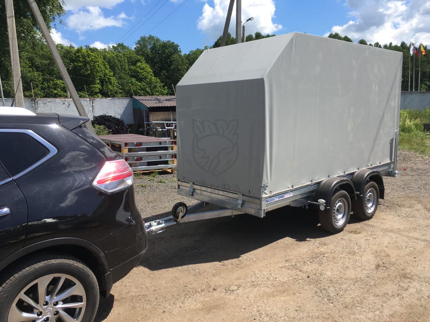 Двухосный прицеп МЗСА 817732.012 с заводским трапом и ЕВРО тентом