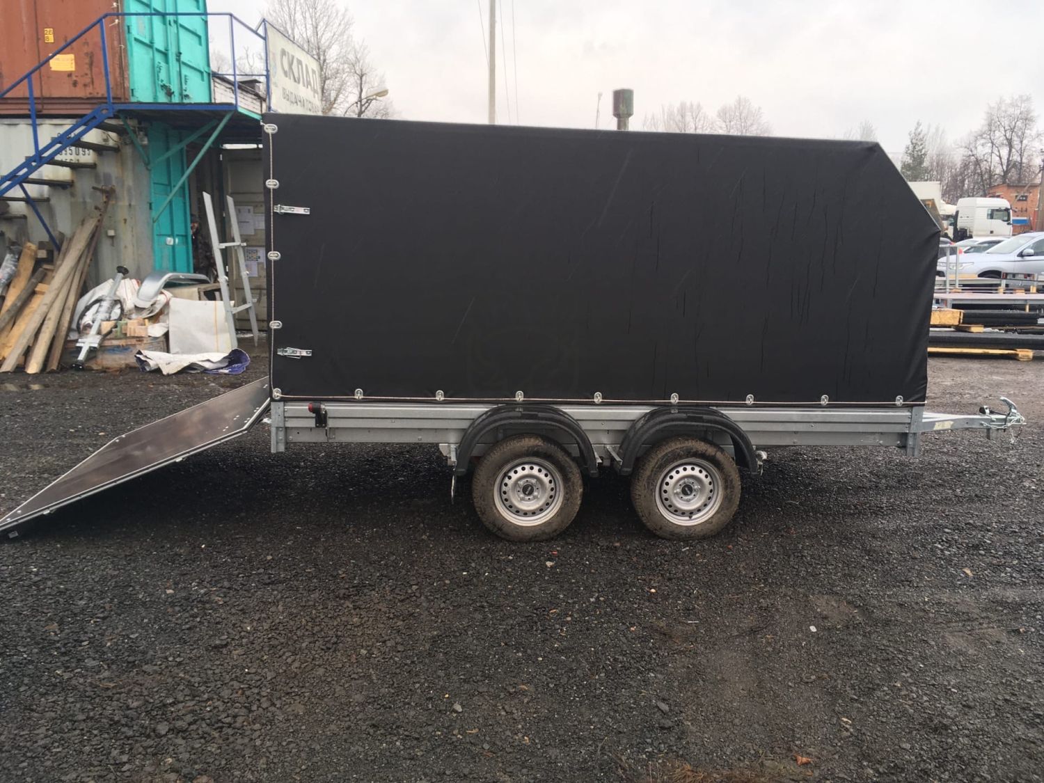 Прицеп МЗСА 817736.012 с трапом и ЕВРО тентом